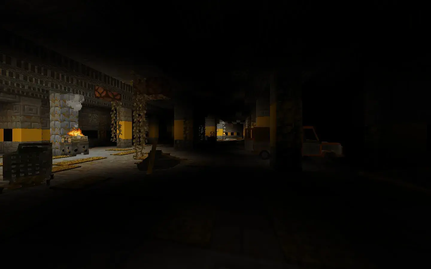 Dark garage with abandoned vehicles