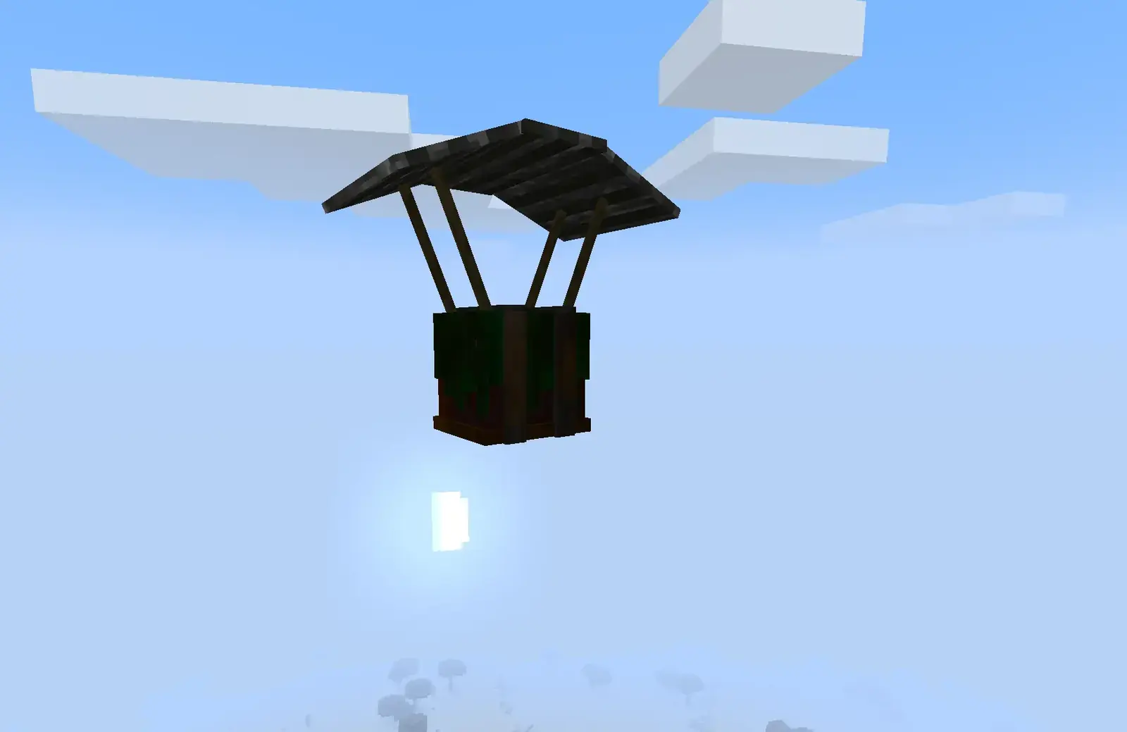 Supply crate descending under a parachute